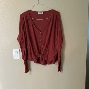 Red button up sweater